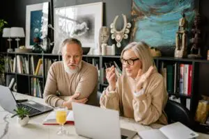 Care Studio | an image showing an elderly couple browsing the internet on a laptop